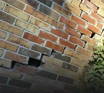 Cracked or separating bricks