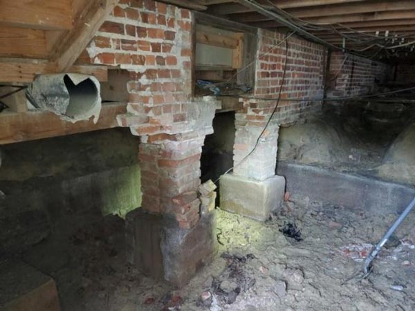 Team Atlas partners with community to restore foundation to 250-year-old Suffolk Baptist Church