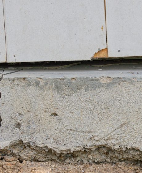 a house foundation that cracks due to unstable soil conditions