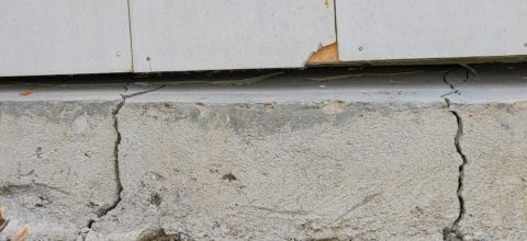 a house foundation that cracks due to unstable soil conditions
