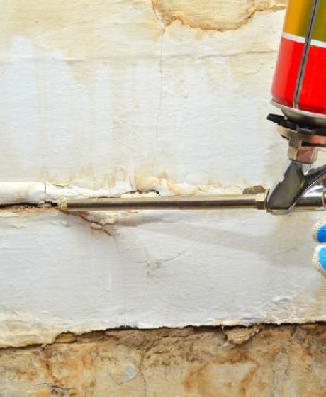 Wall repair by construction foam
