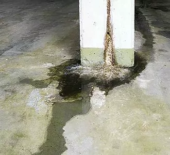 water-damage-in-concrete-construction-with-calcium-and-rust-depo
